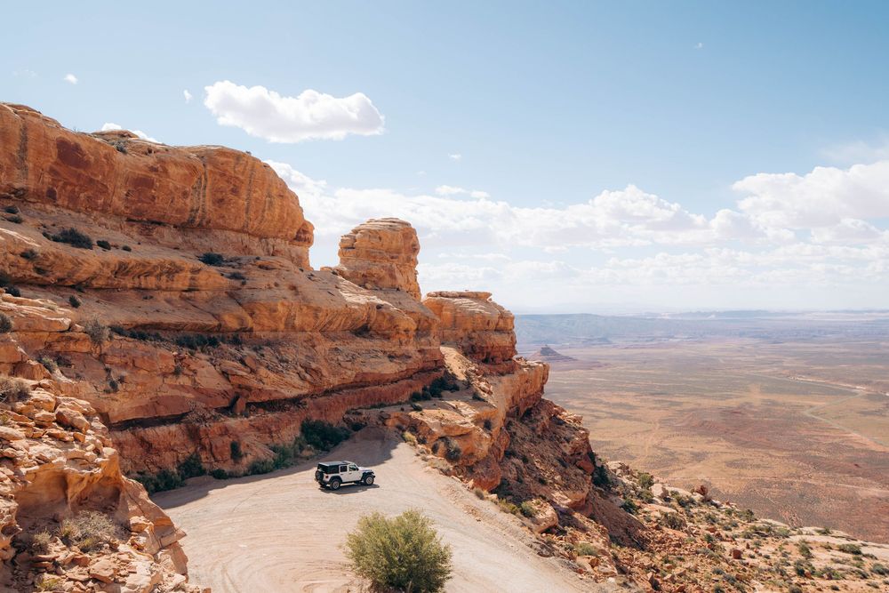 A series of panoramic photos showing scenic red rock formations and desert landscapes at Canyonlands National Park.