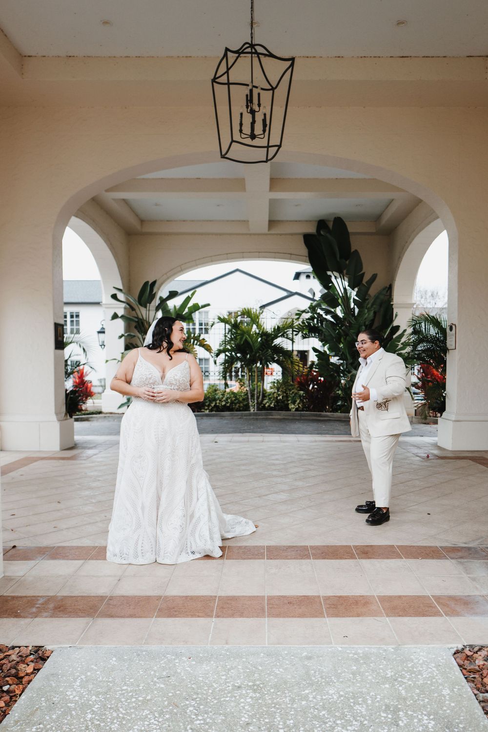 Elegant wedding photo sequence showing couple in white attire posing under Mediterranean-style arches with tropical plants.