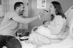 Candid black and white photographs capturing intimate moments between family members with a newborn baby.