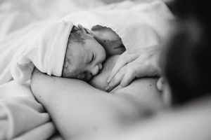 Black and white image of hospital care being provided.