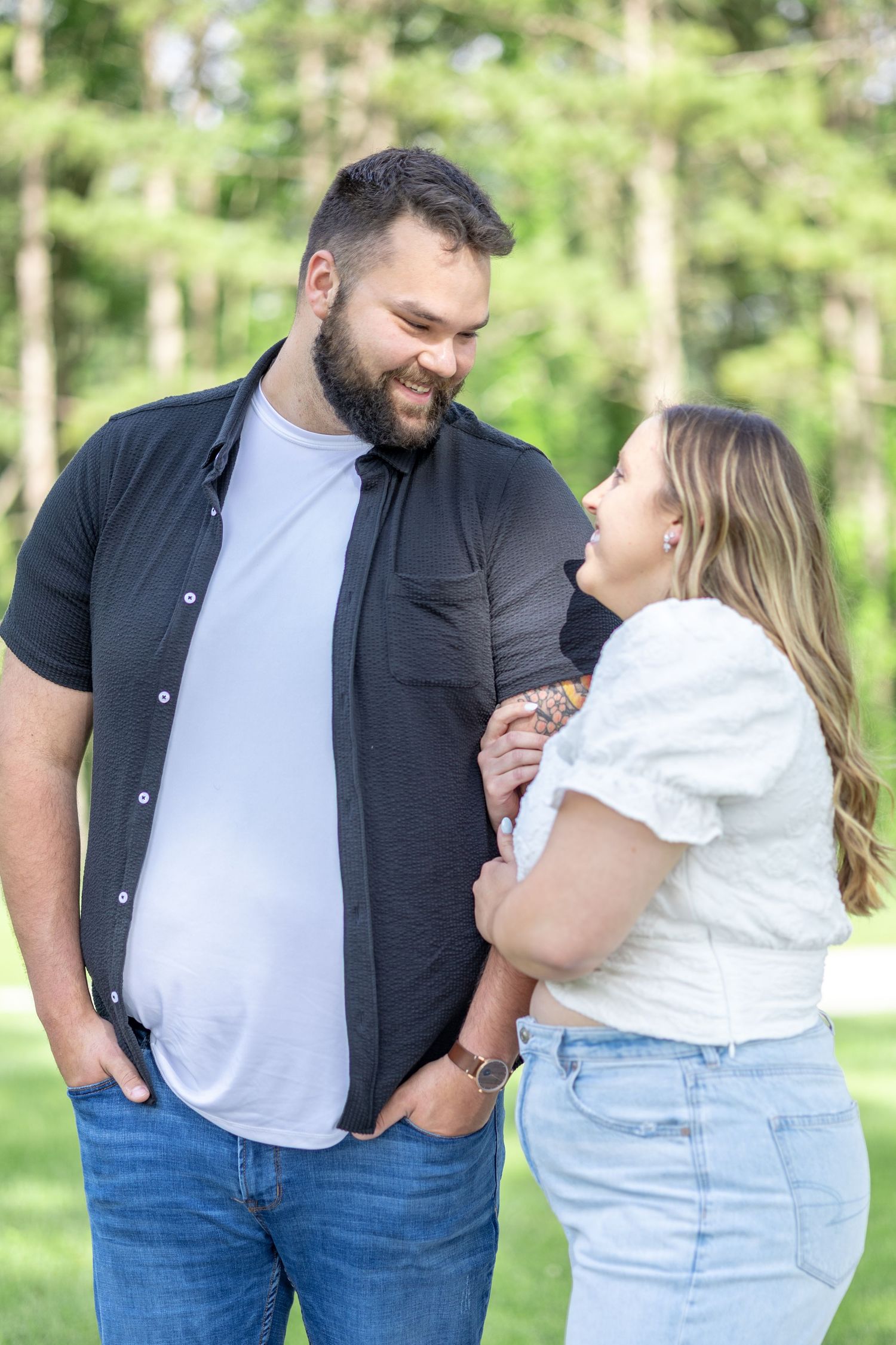 Springfield, IL photographer captures a couple smiling at each other during a session in Central, IL