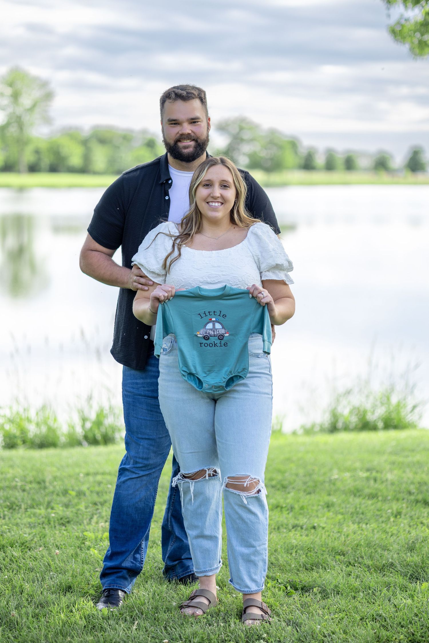 Springfield, IL photographer captures a couple smiling during a session in Central, IL