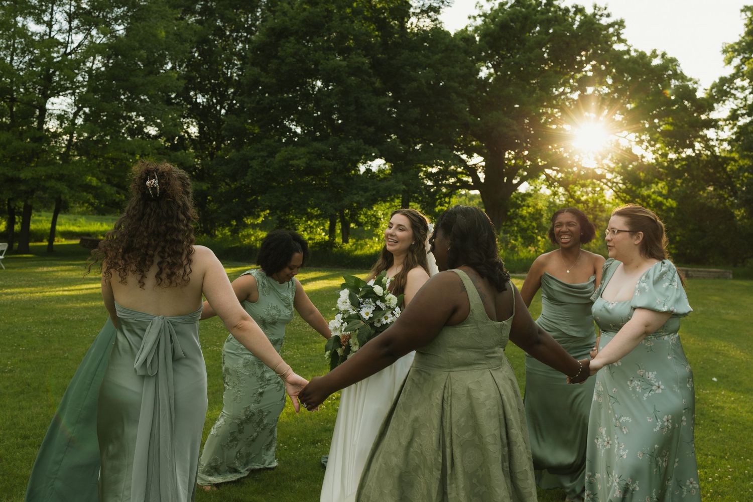 A girl runs through of a field of flowers during her cinematic, candid senior photos during golden hour in Flushing, Michigan.