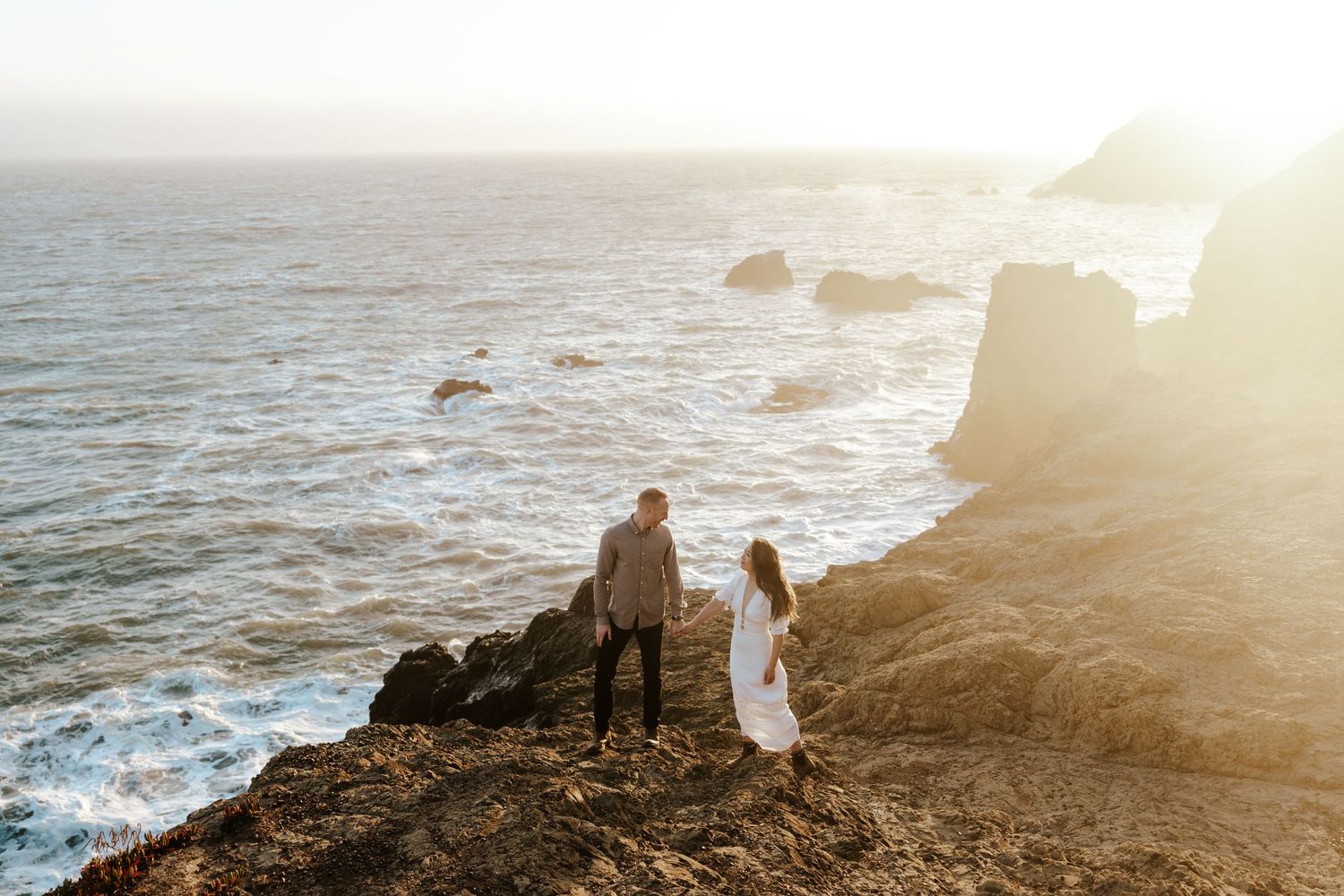 marin headlands cliffside sunset engagement photos that look like the big sur coastline but in the north bay near san francisco