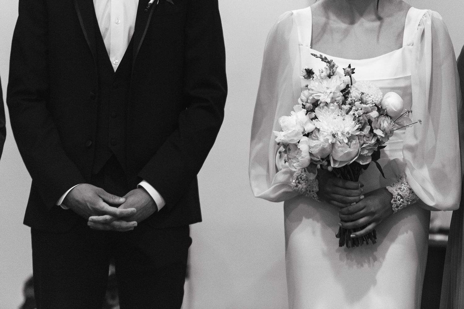 An overhead view of a romantic moment on an elegant curved staircase.