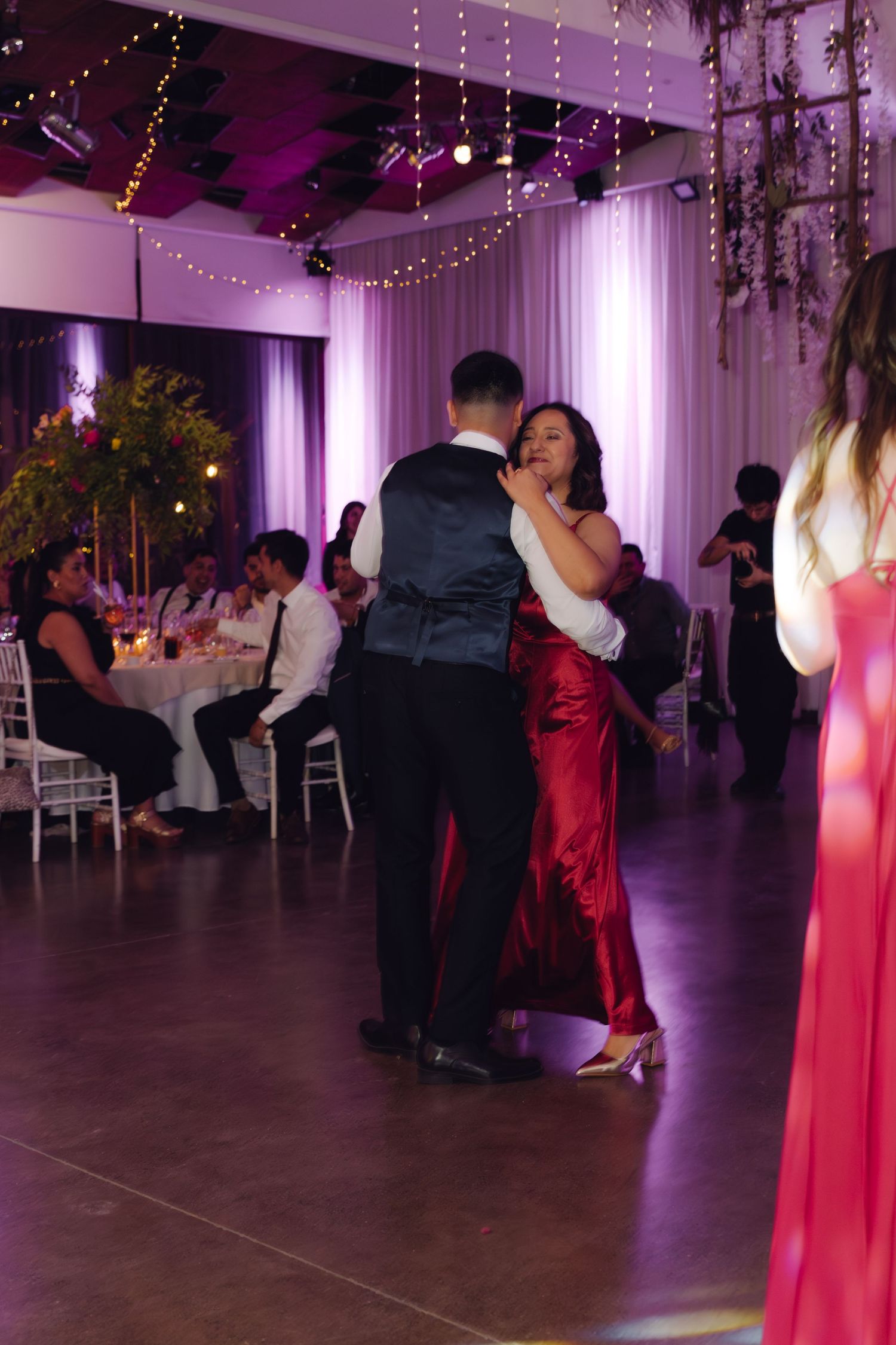 Mother and son sharing an emotional dance on the wedding reception dance floor.