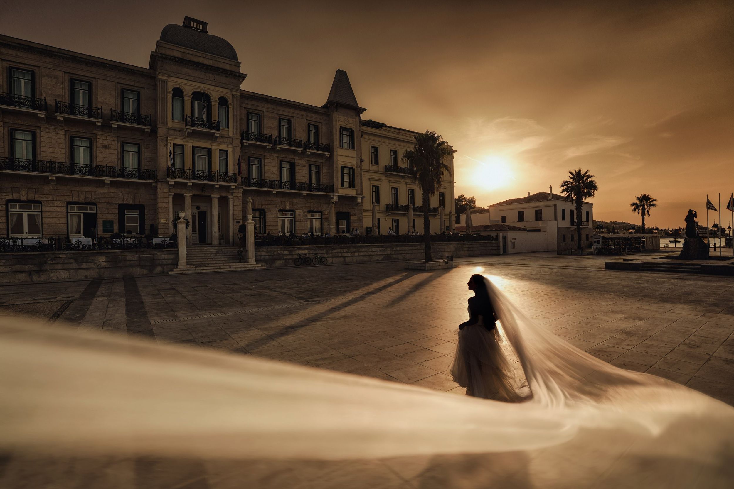 Dramatic wedding photography sequence on red rock formations at sunset.