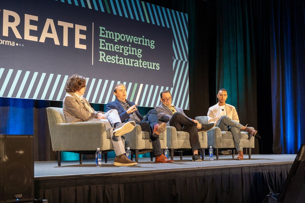 Four panelists discuss empowering emerging restaurateurs on stage at CREATE conference.