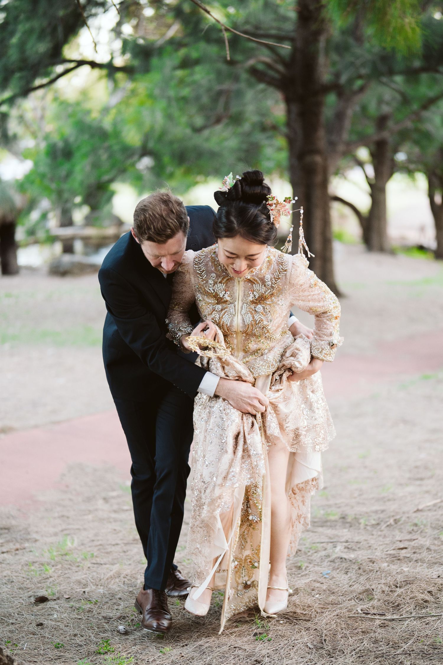Cameron and Lulu strolling along a park path