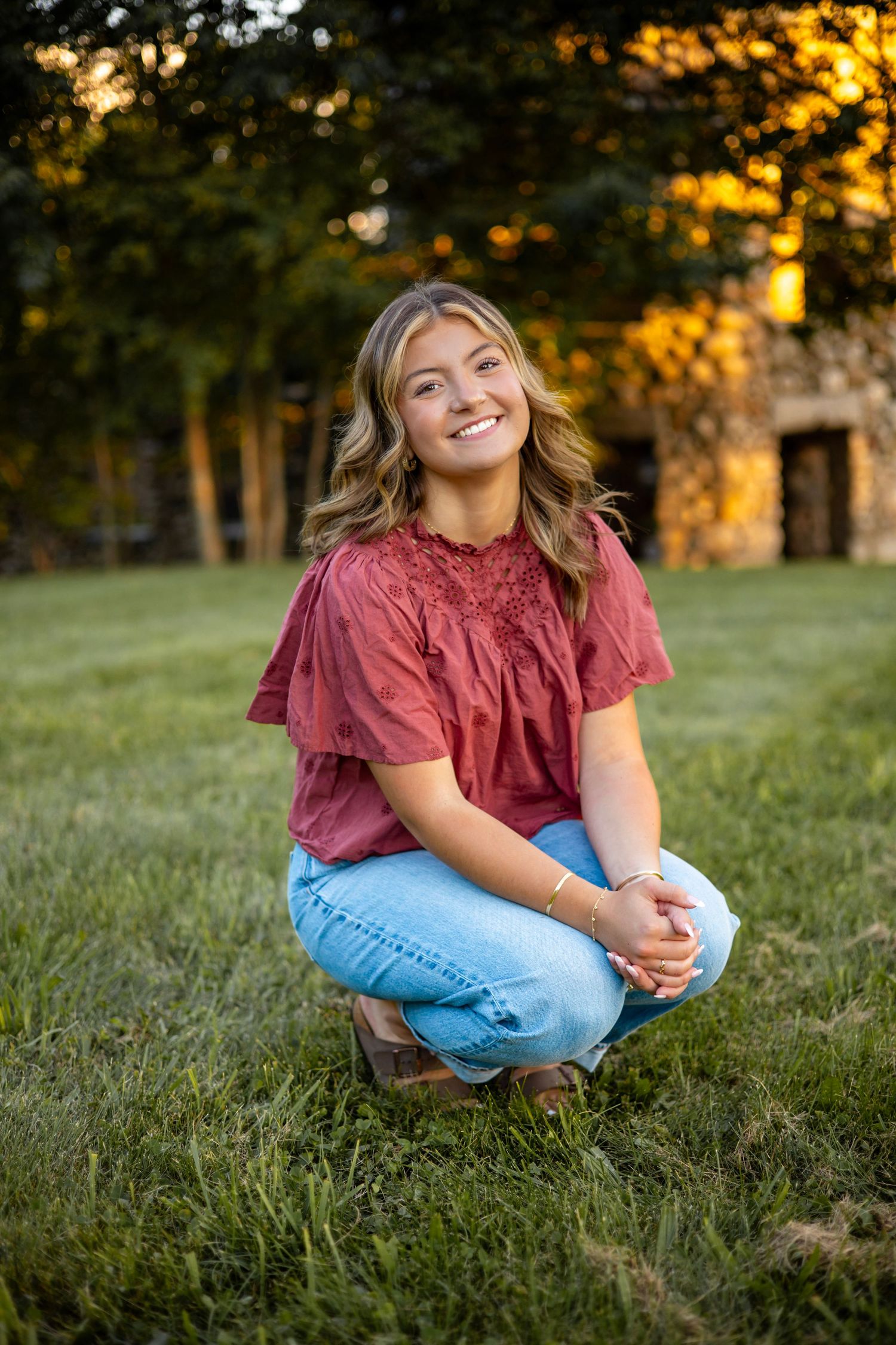 Senior posing for a photo in a scenic location in Massachusetts