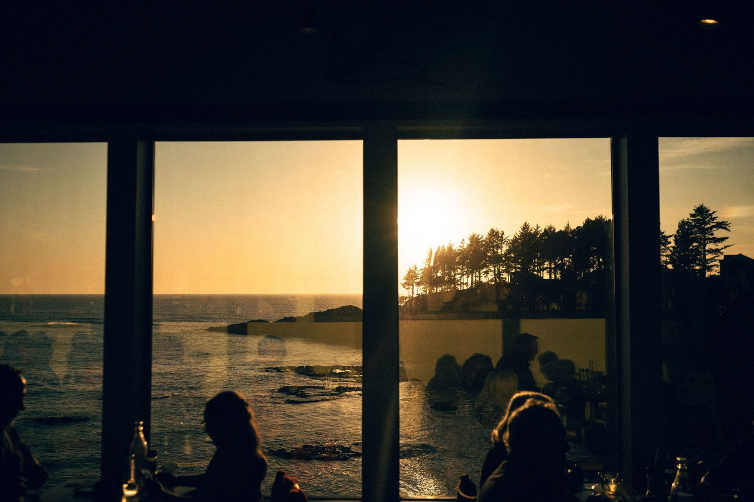 Depoe bay sunset views. Oregon Coast Road trip travel photography - outdoor and wellness focused travel photography. Tidal Raves Restaurant