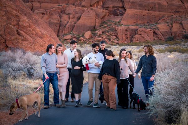 famiy-reunion-photos-portraits-st-george-vacation-ut-utah-red-rocks-walking-casual-snow-canyon-state-park-dog-scenic-professional-rescue-dog