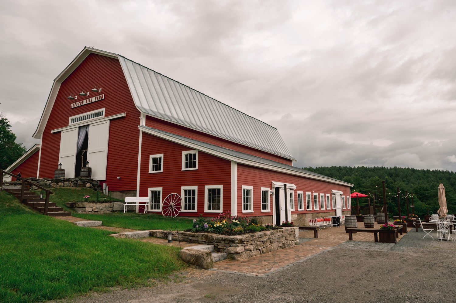 Rustic barn exterior at a New England summer wedding