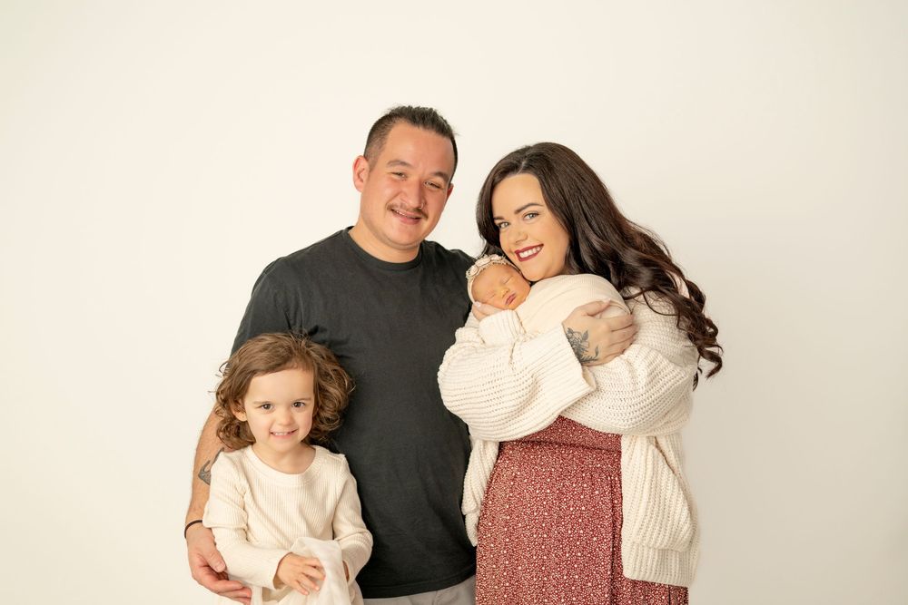 A series of candid family portraits showing loving moments between parents and children against a light background.