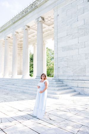 A series of three photos showing someone in a white dress posing at an elegant columned memorial venue in natural lighting.