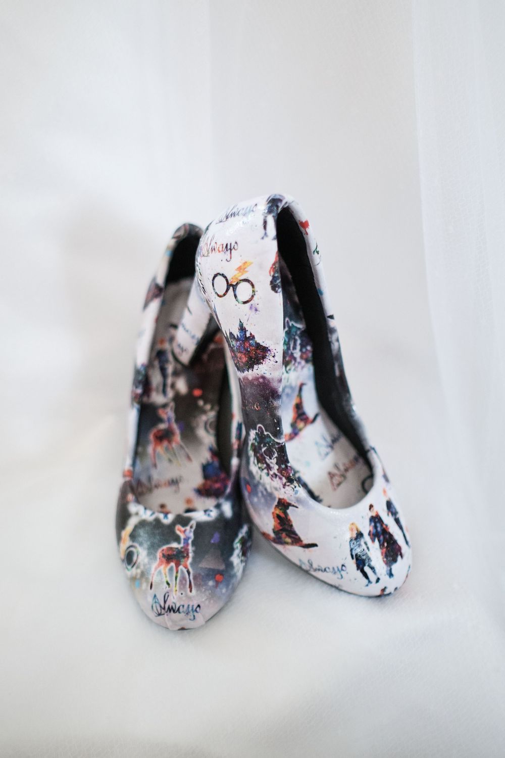 Whimsical Harry Potter themed ballet flats with character prints on white background.