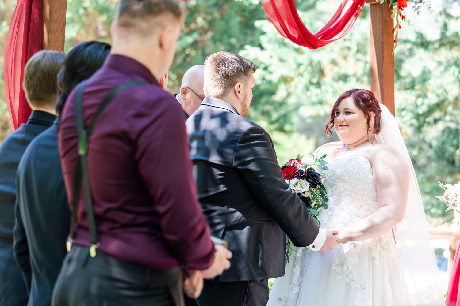 bride looking at her groom during the ceremony