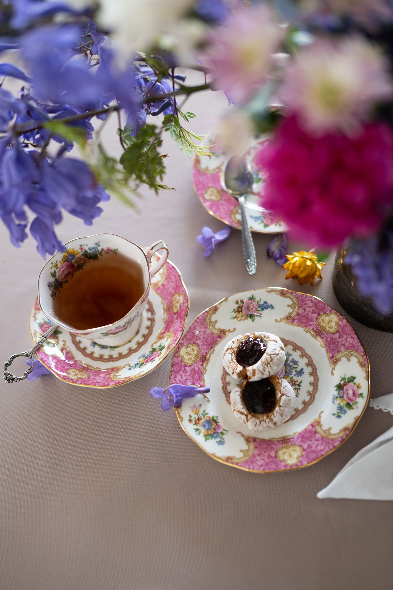 Lady Carlyle crockery showing off Sugar Mummah's beautiful jam drops surrounded in flowers.