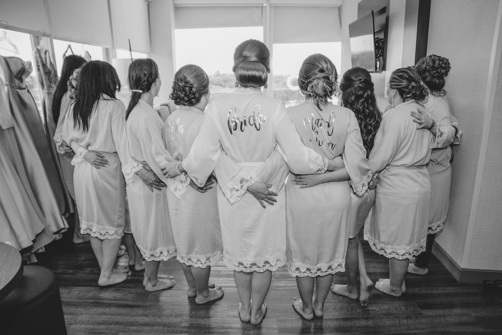 bridal party getting ready. robes. cambria hotel. McAllen, Texas. Wedding photographer