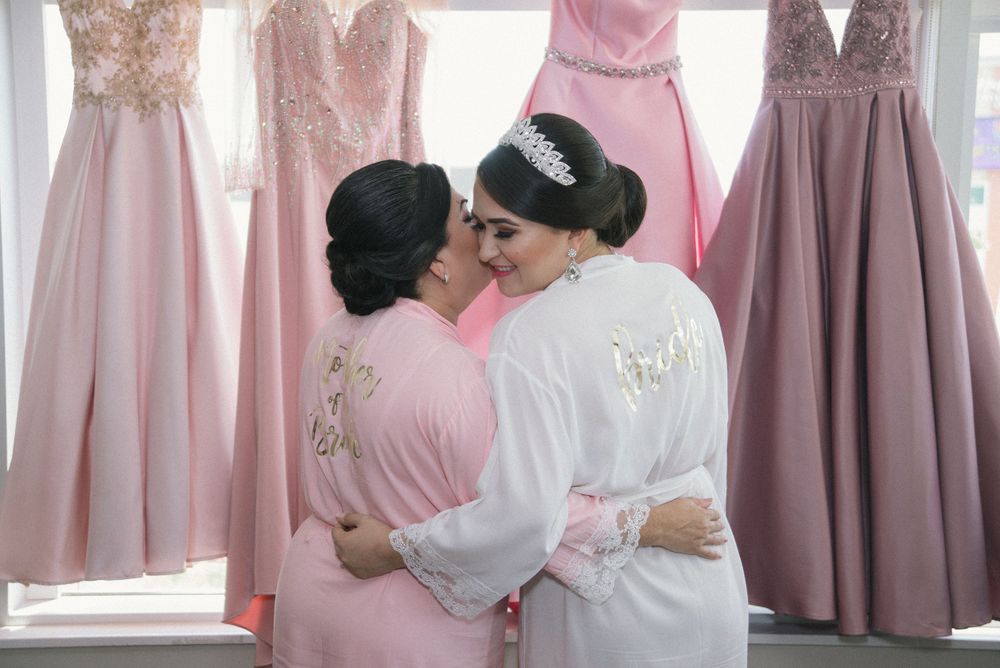 mother and daughter at getting ready. cambria hotel. McAllen, Texas. Wedding photographer