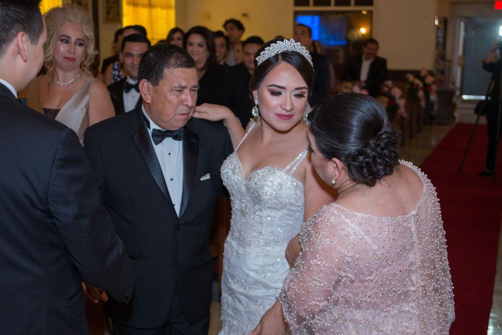 wedding ceremony. bride walking down the aisle. St Jude Catholic Church. Pharr, texas. wedding photographer
