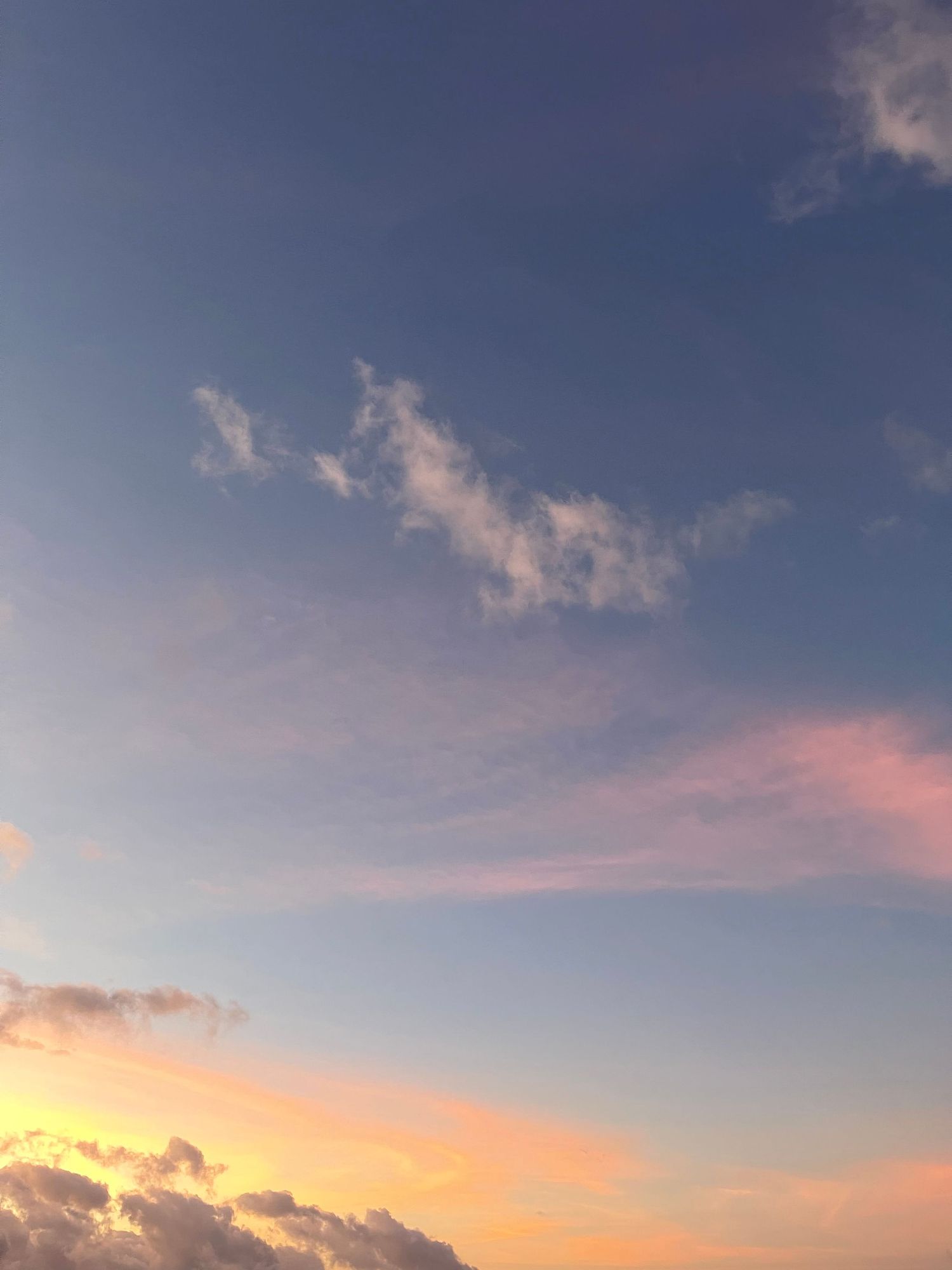 hawaii sunrise sky filled with blue pinks and orange colors