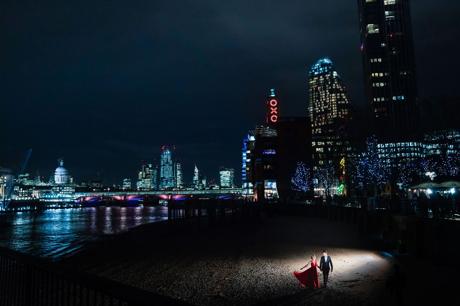 Couple by the Thames river during London Pre-wedding shoot