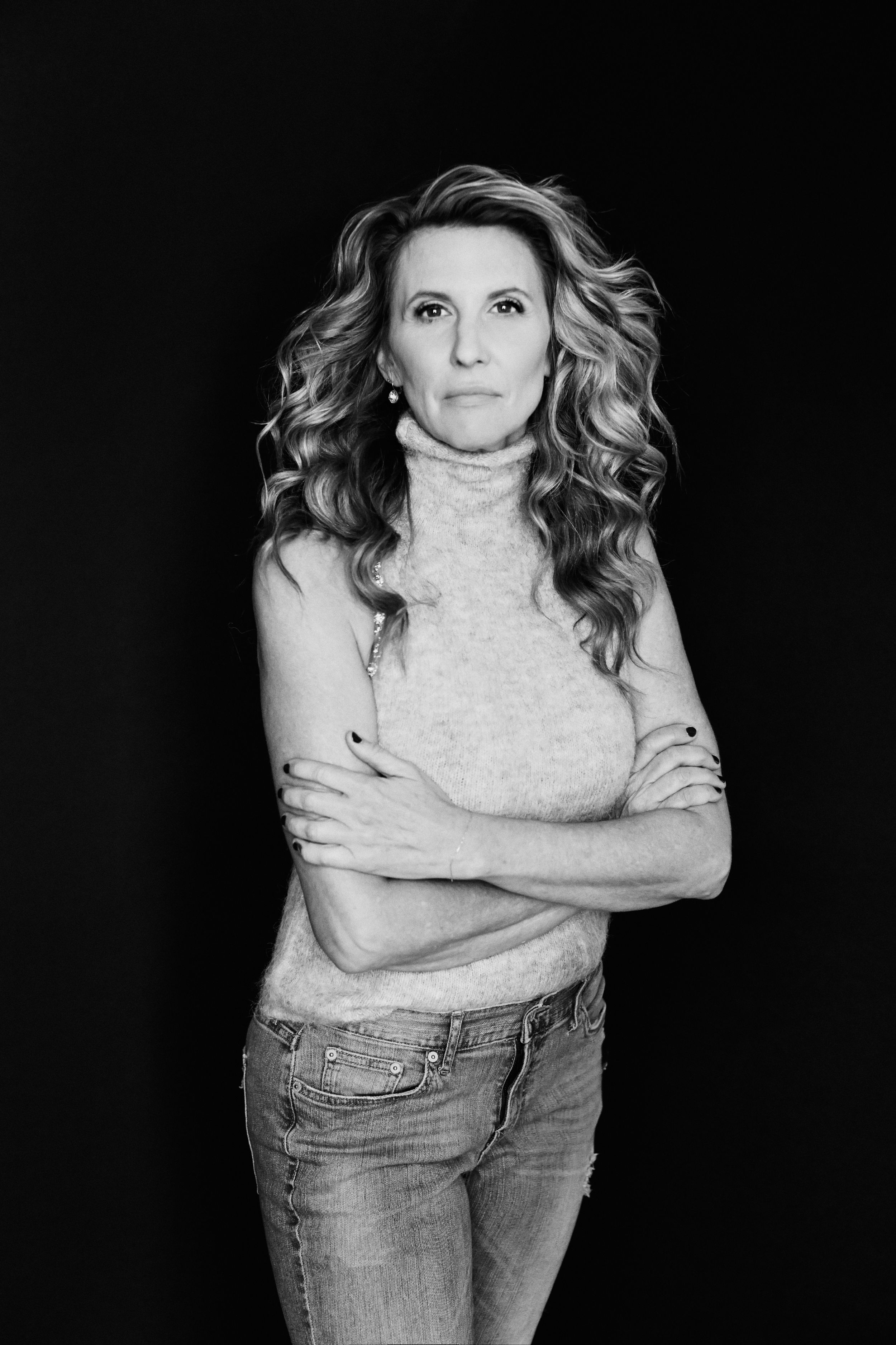 Black and white portrait sequence of woman in casual attire with crossed arms.