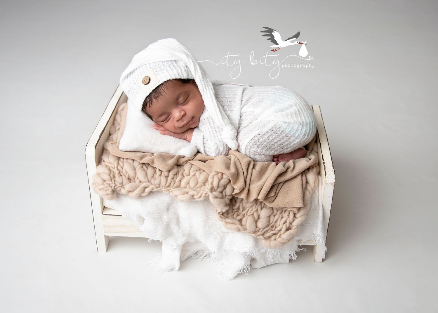 Jose Ramirez Smiling during newborn photography session Cleveland Ohio