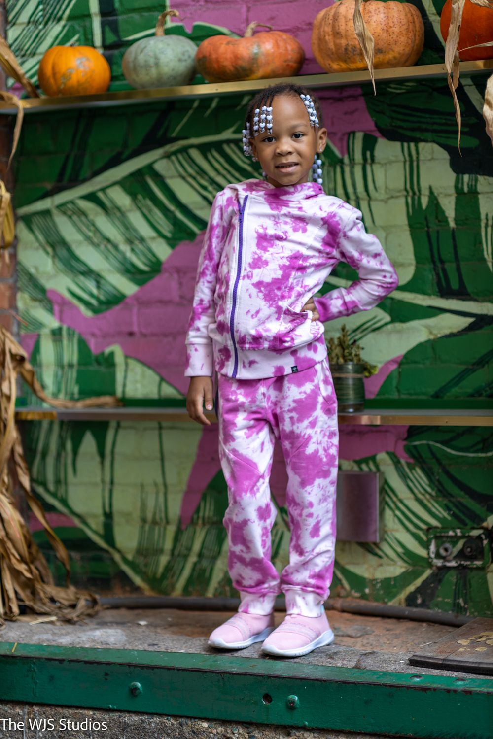 little girl in pink camouflage 2 piece