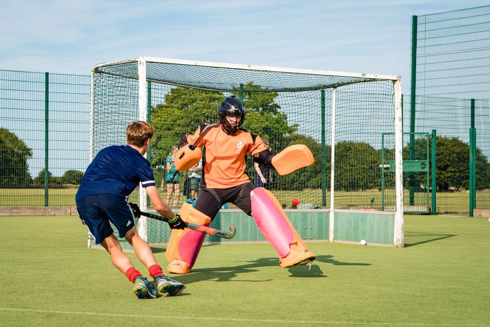 goalie with ball sports photographer uk