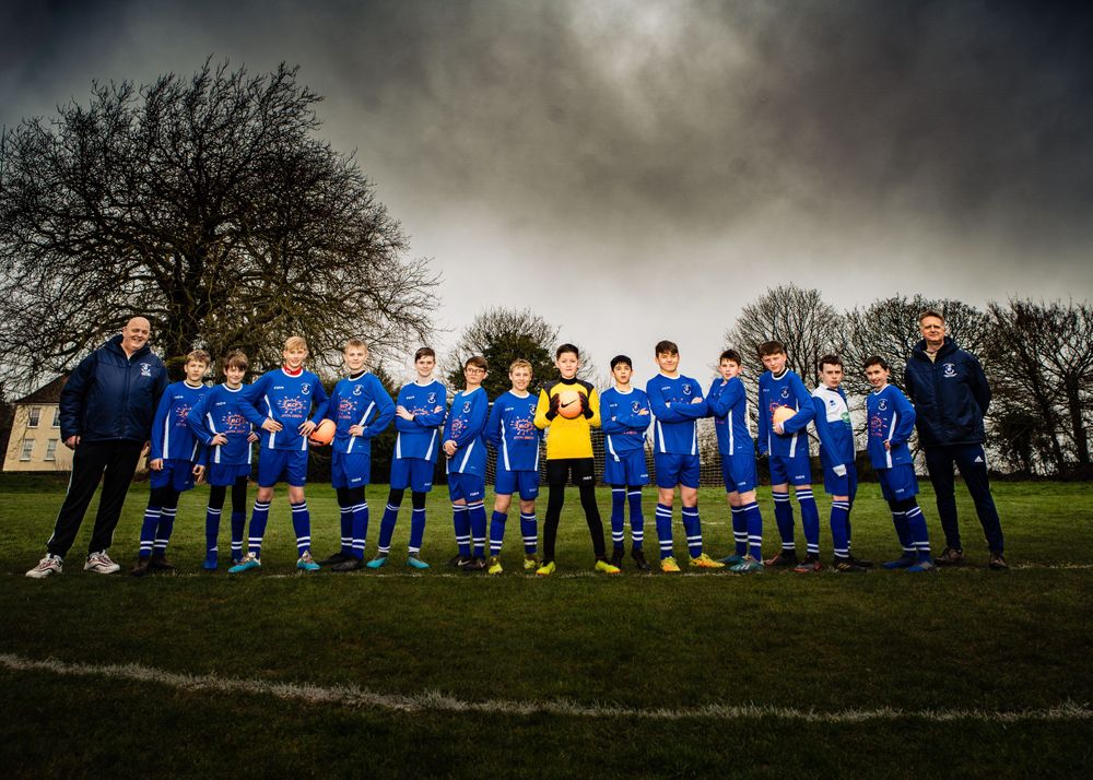 Youth football team group photograph taken on a pitch in Gloucestershire