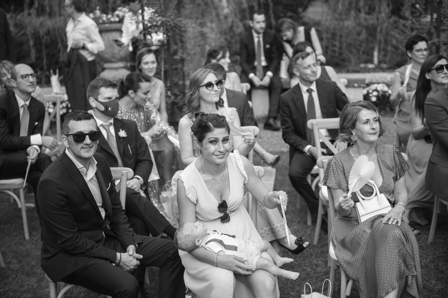 An emotional wedding moment captured in black and white photography.