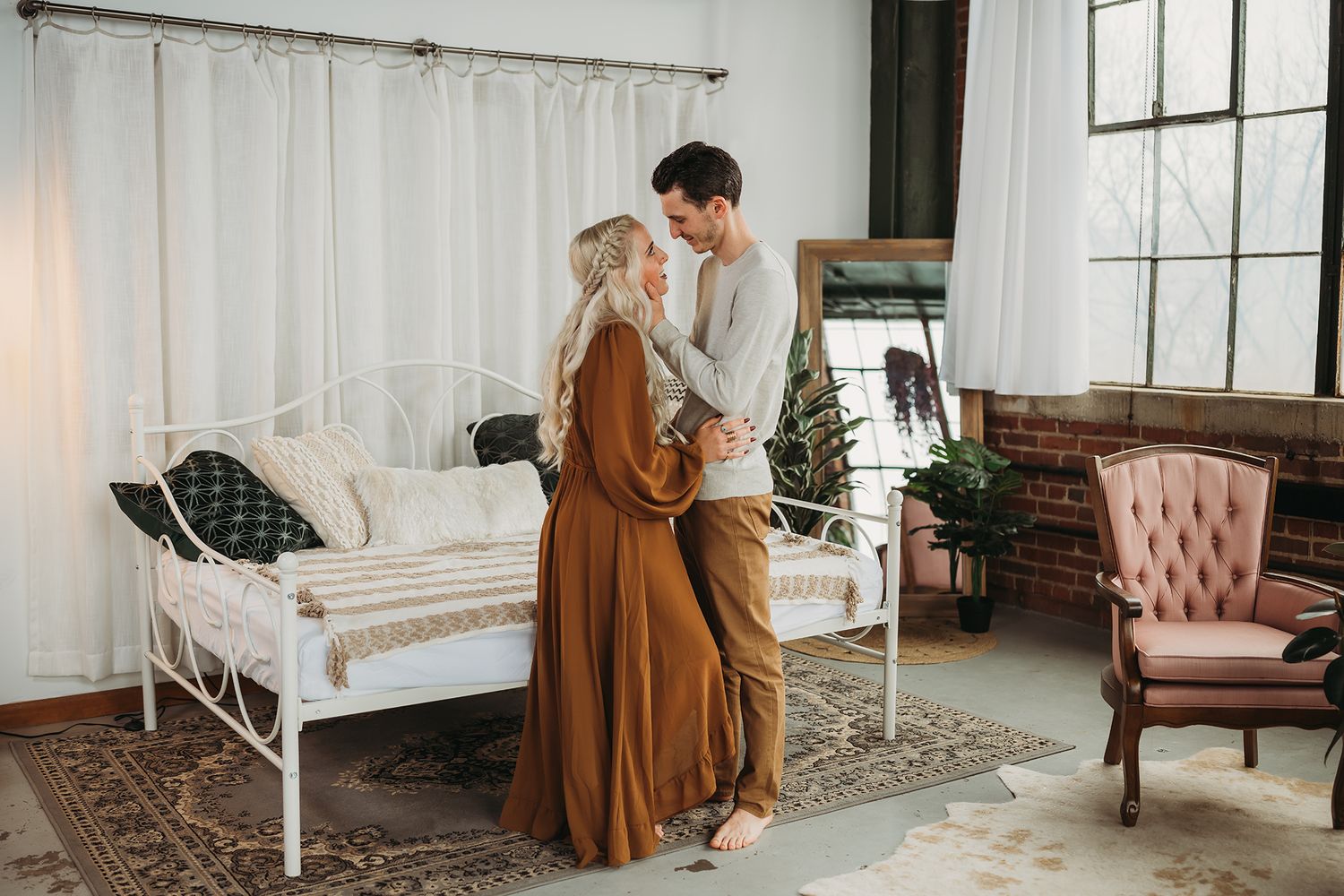 Engaged couple embracing in Akron Ohio captured by Jessica Hepp Photography