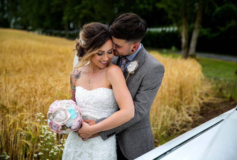 bride & groom in cornfield