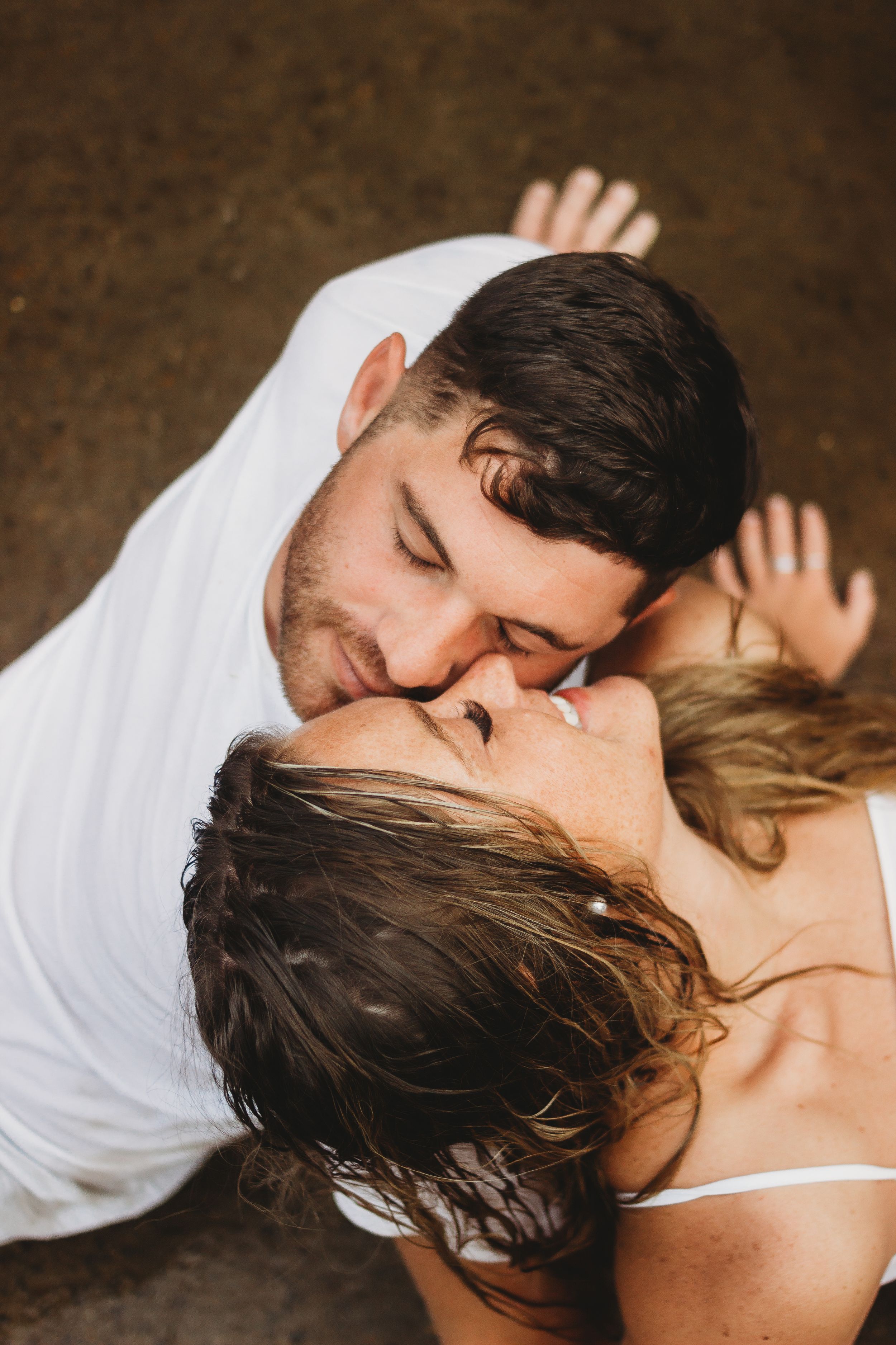 couple smiling and kissing