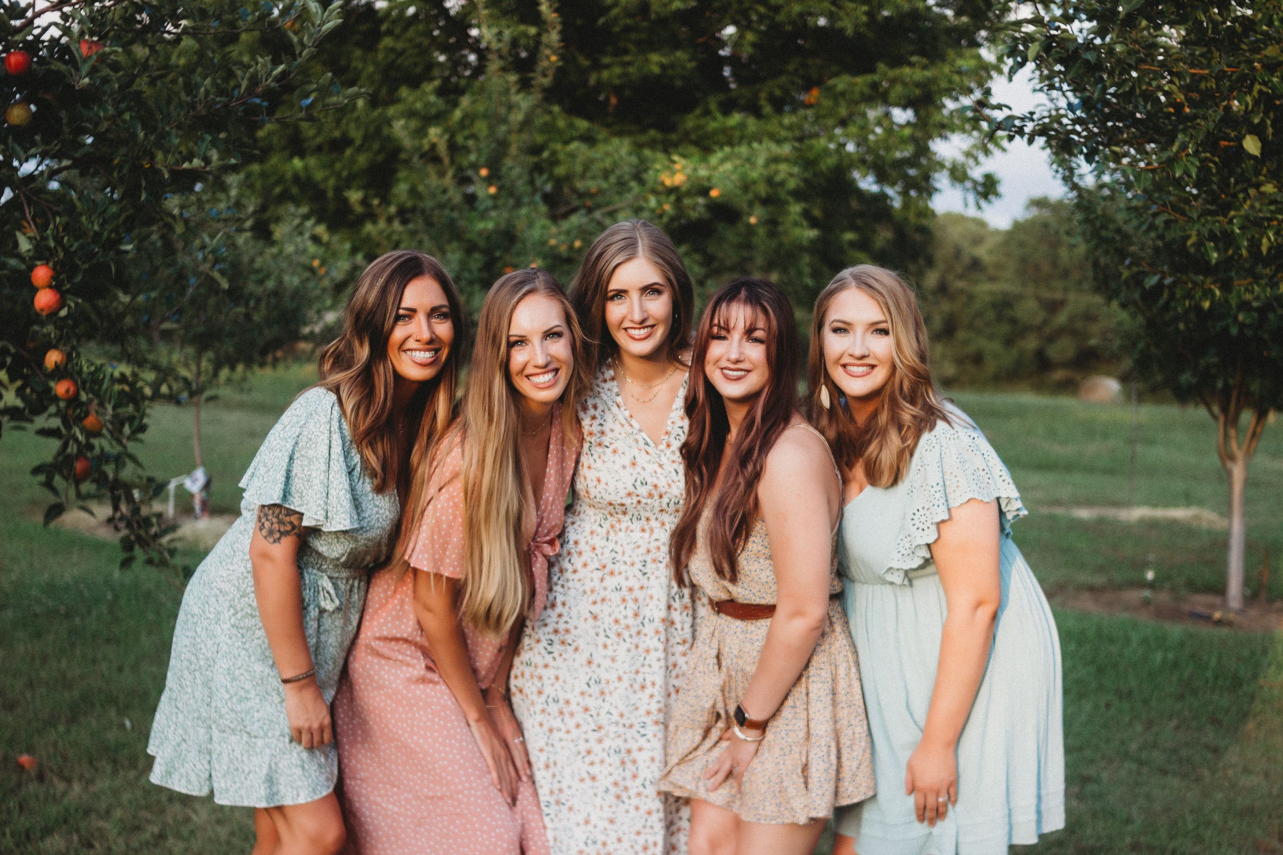 group photo of girls in dresses