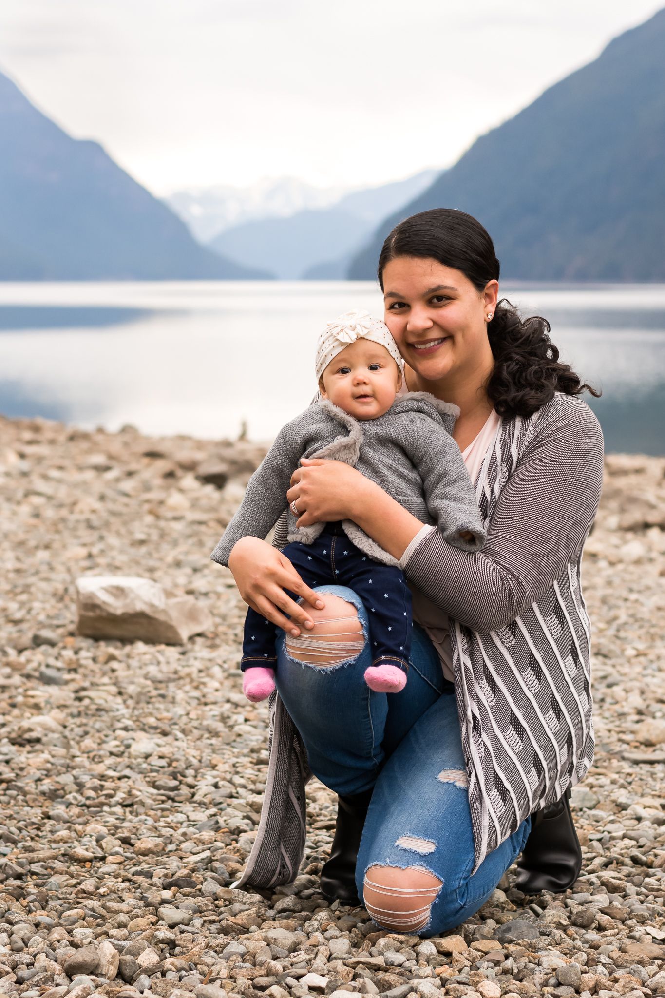 Mom and baby with mountains at Alouette Lake