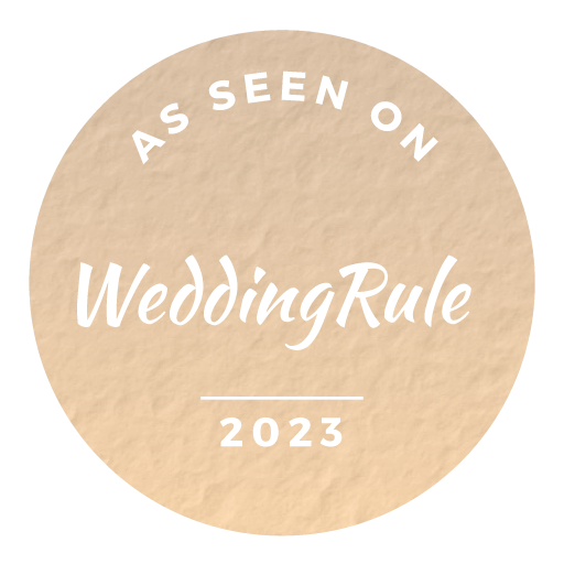 Neutral toned circular badges displaying WeddingRule branding for 2023.