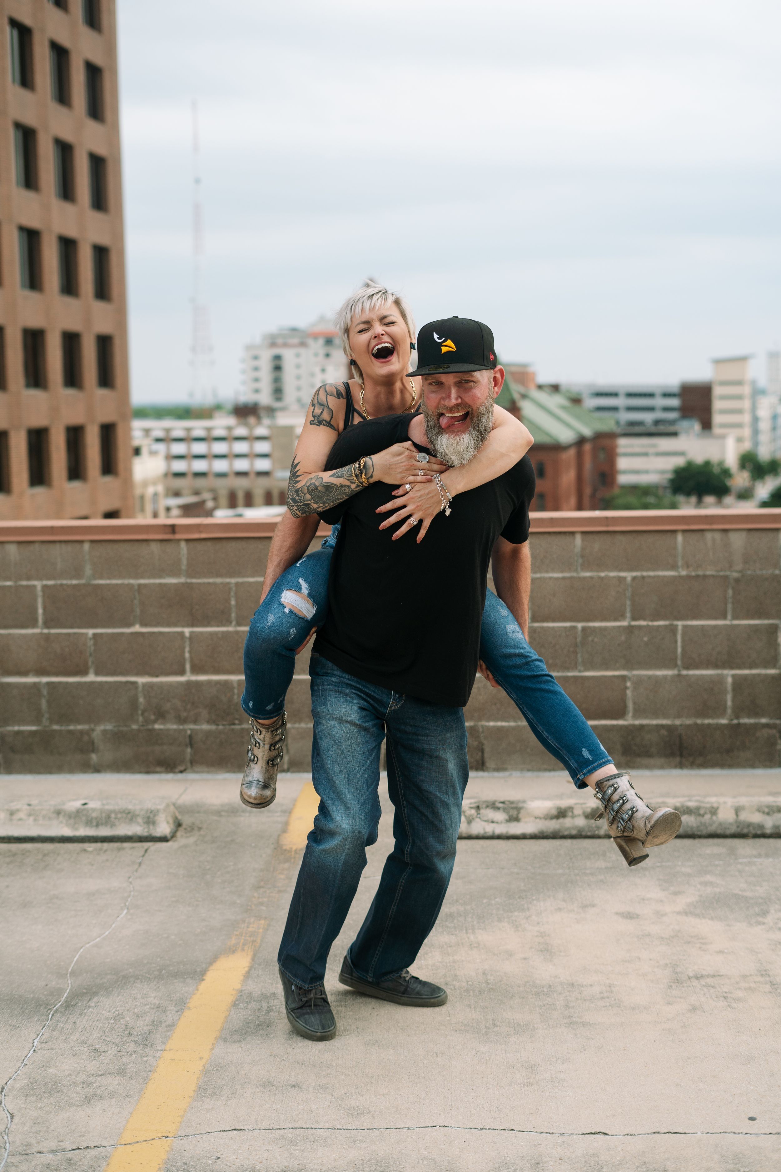 laughing couple engagement shoot