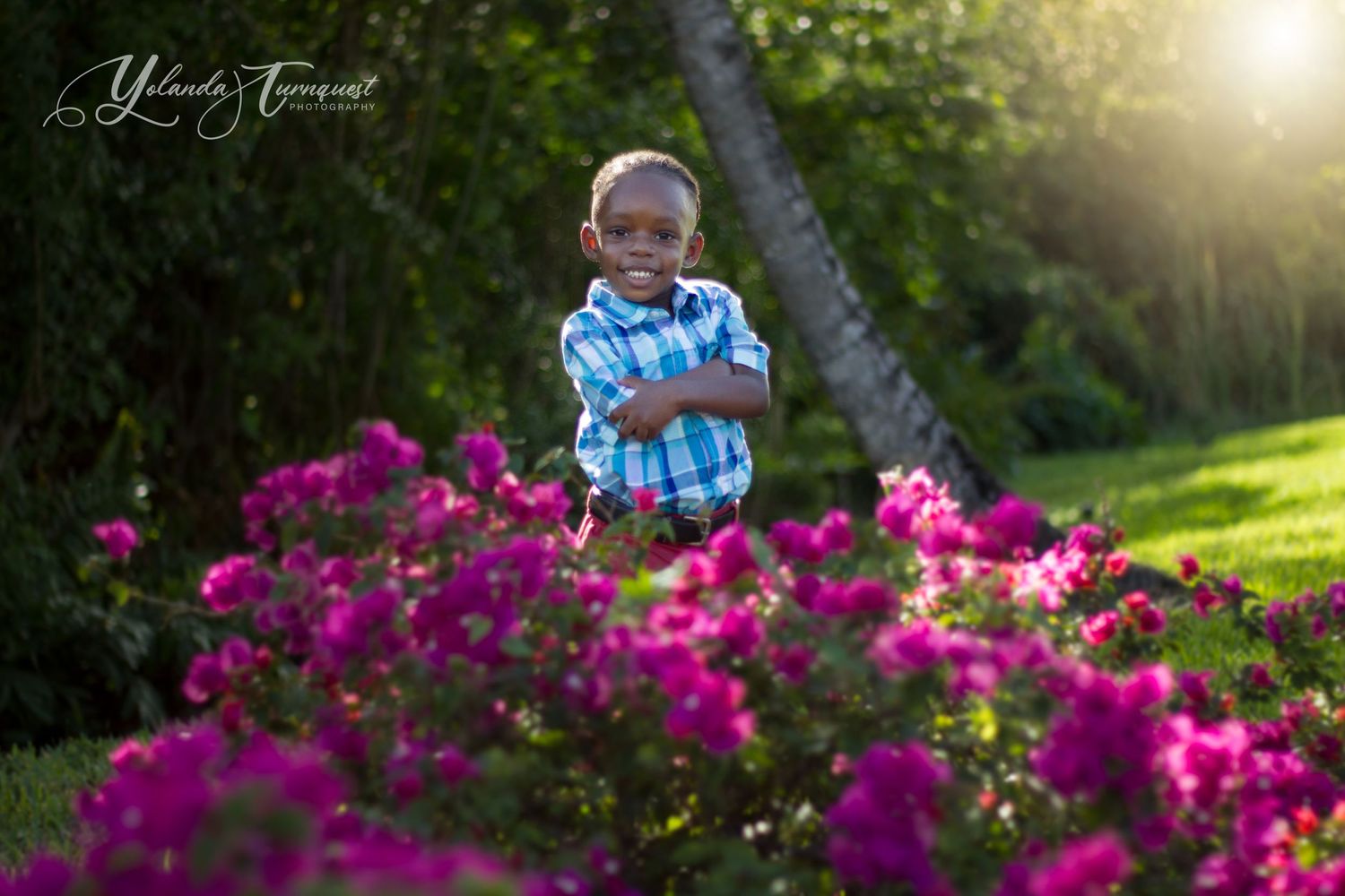 Boy in garden nassau bahamas photographer