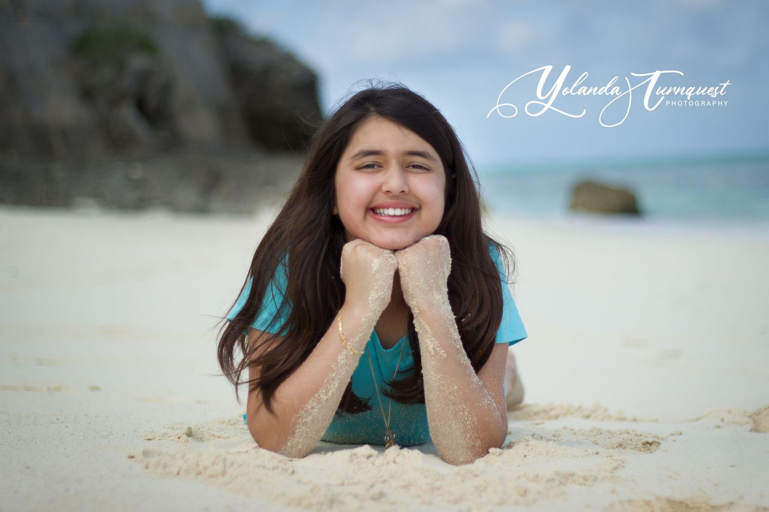 little girl in sand on beach nassau bahamas photographer