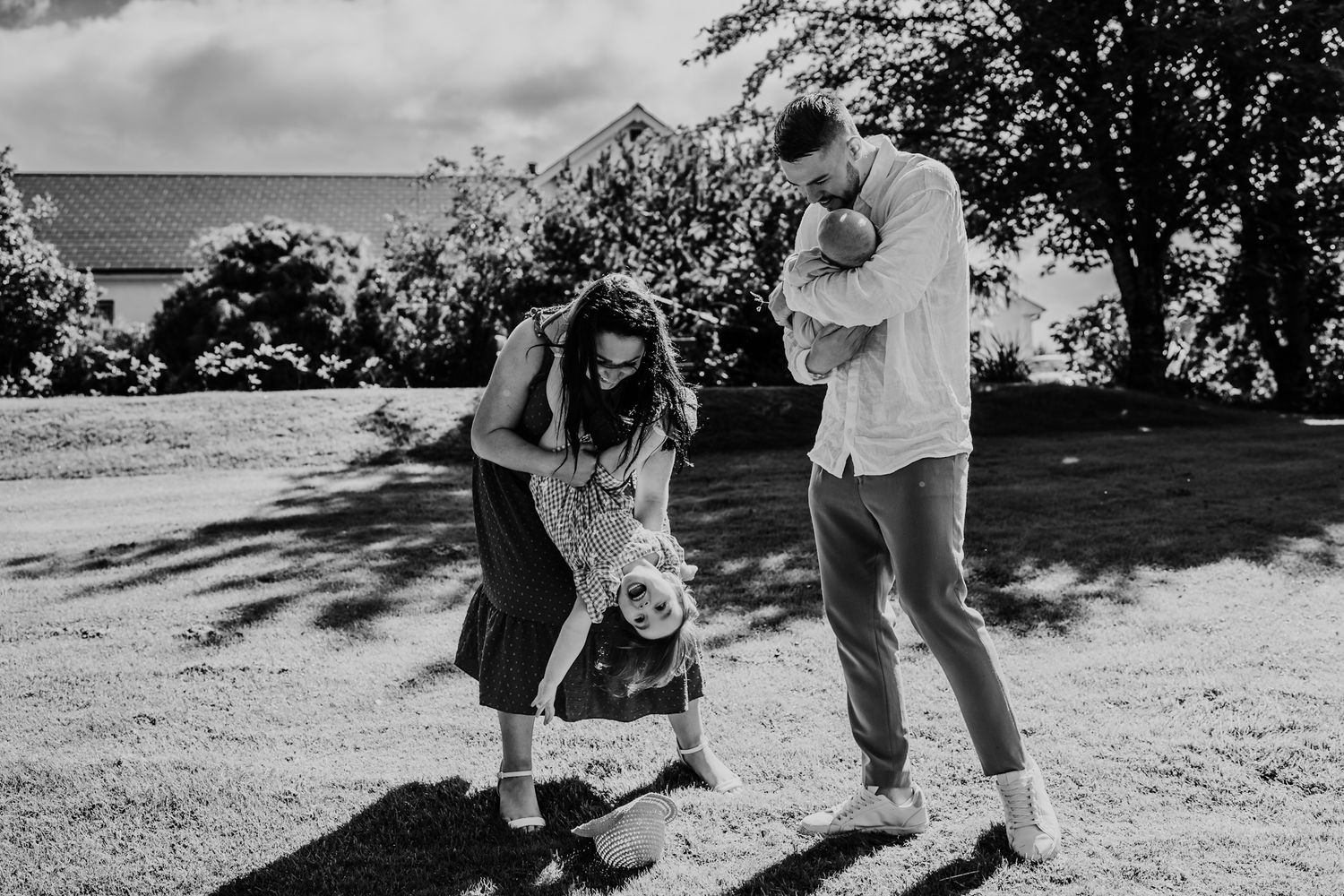 Family-together-having-fun-in-the-garden