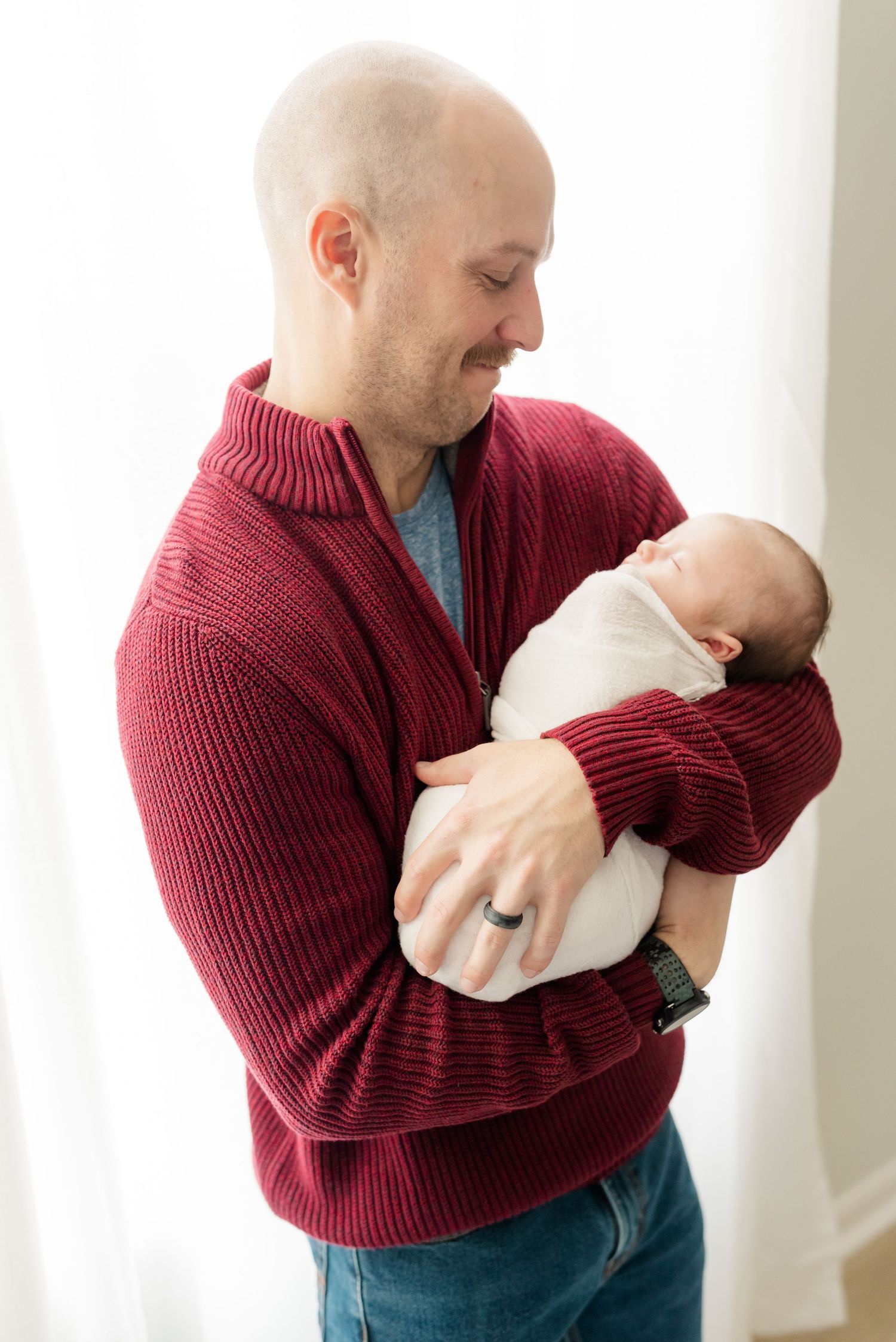 dad holding baby