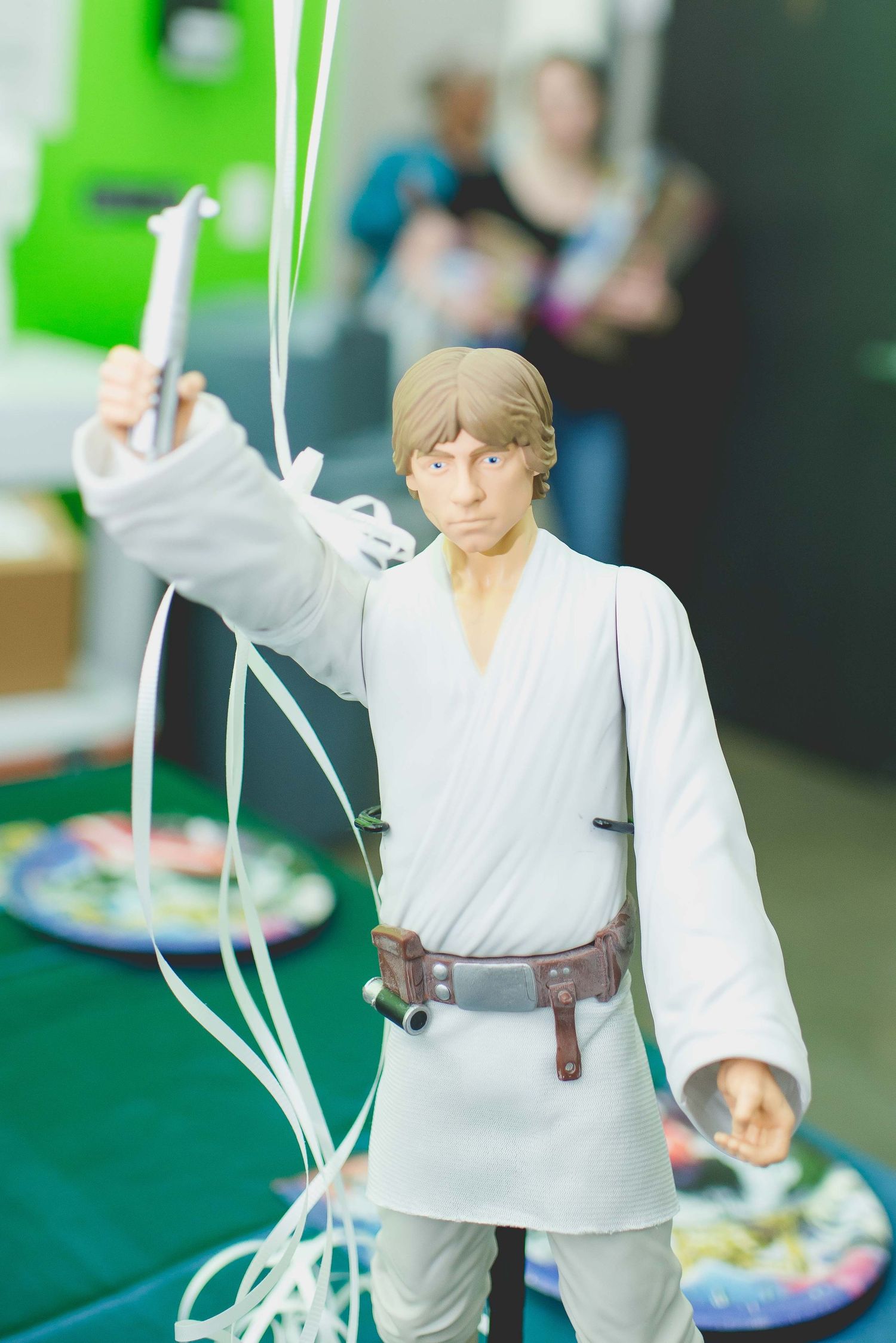 luke skywalker holding birthday balloons