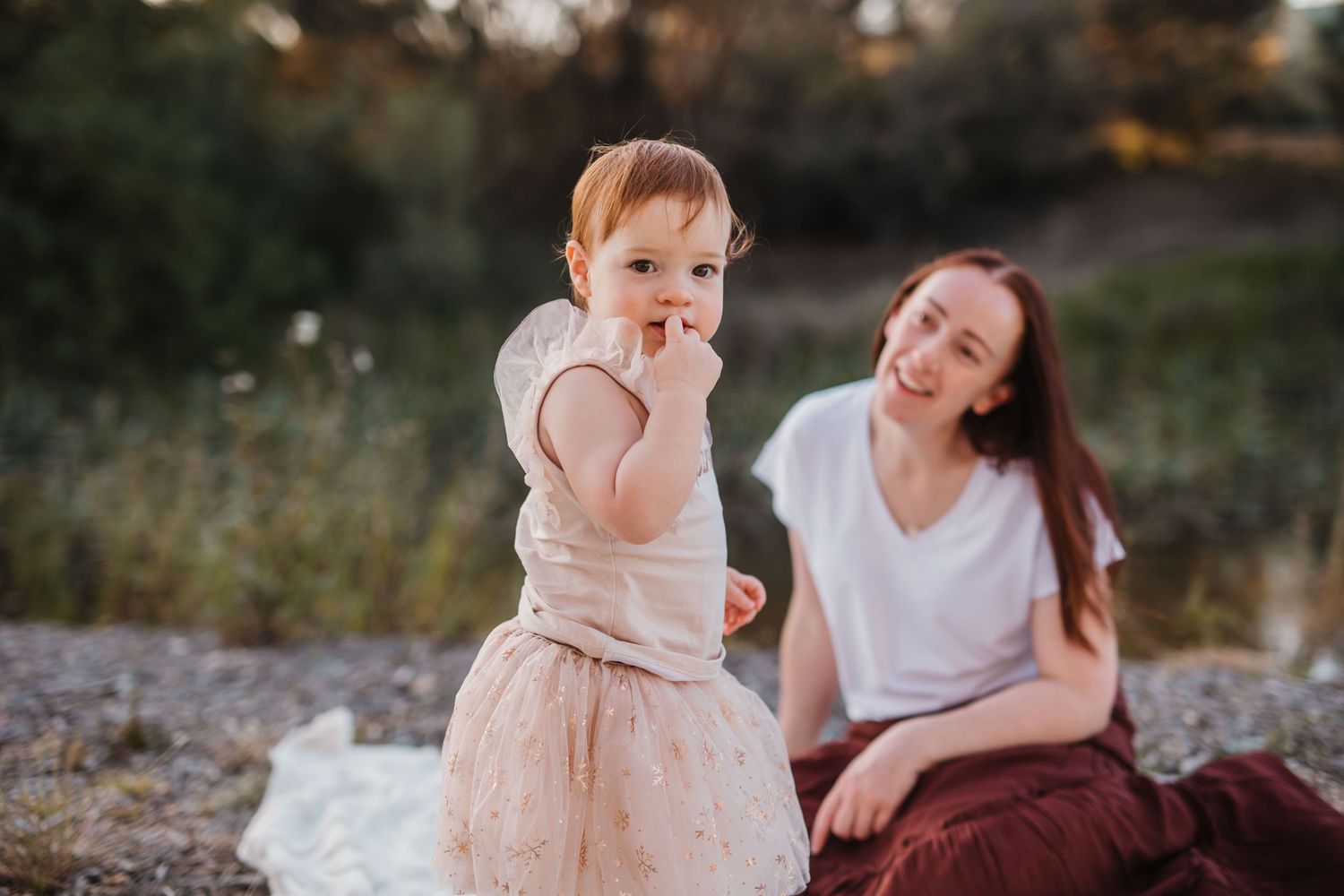 Mother watchng her little girl