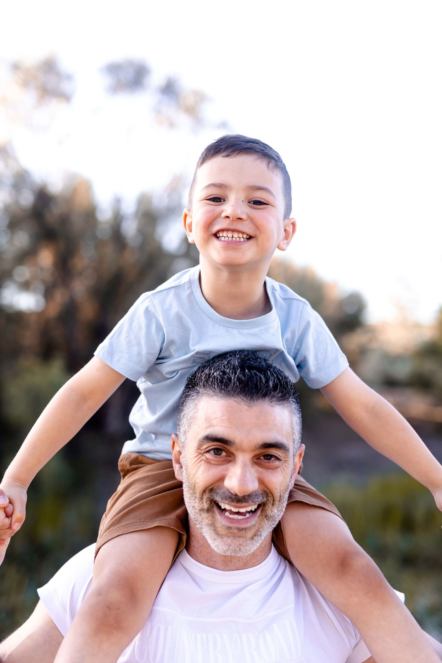Getting a ride on dads shoulders!