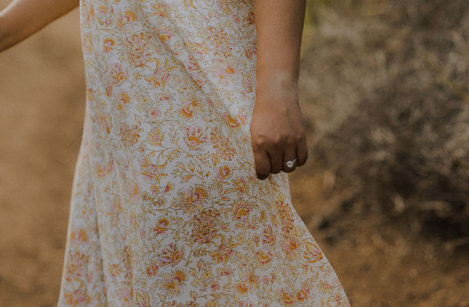 E. Noelle Photography couple engagement in the Los Angeles Malibu hills close up of flowy dress and ring