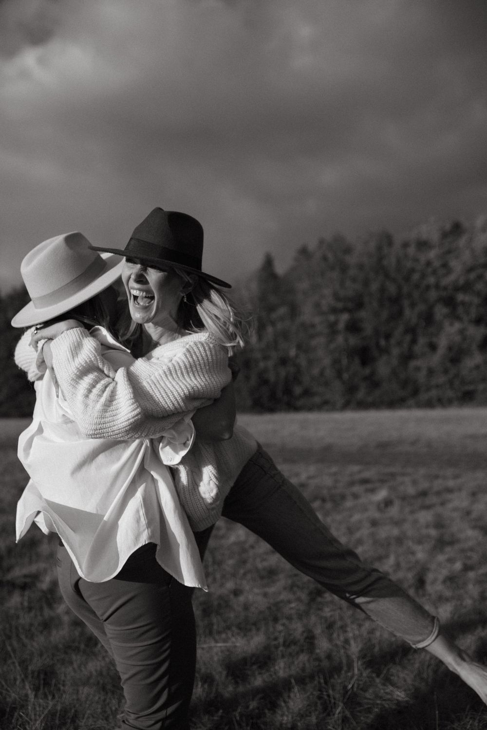 Black and white capture of dynamic movement in an outdoor field.
