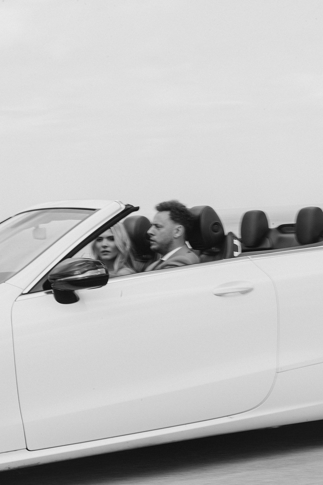 a couple driving away